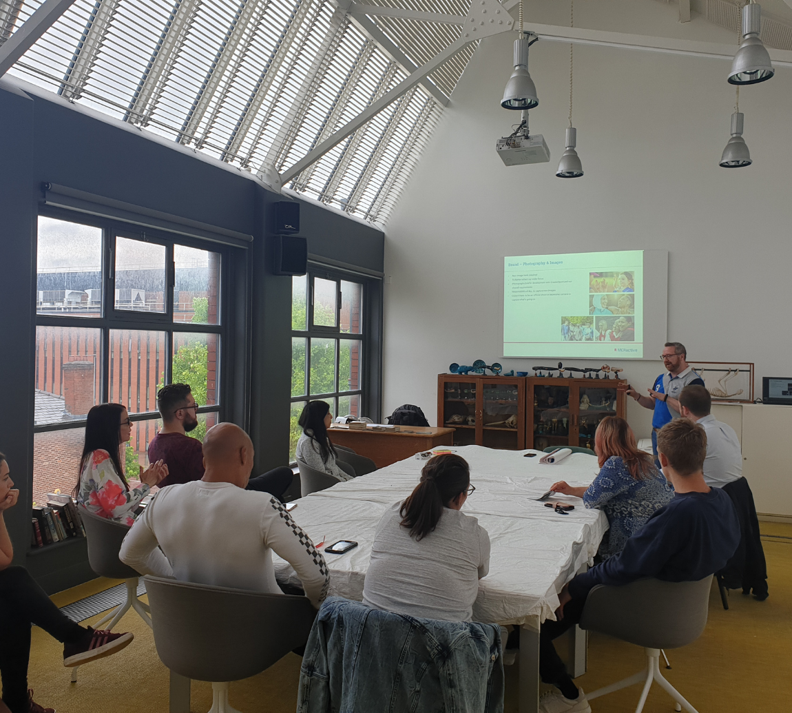 a group of people engaging in a presentation